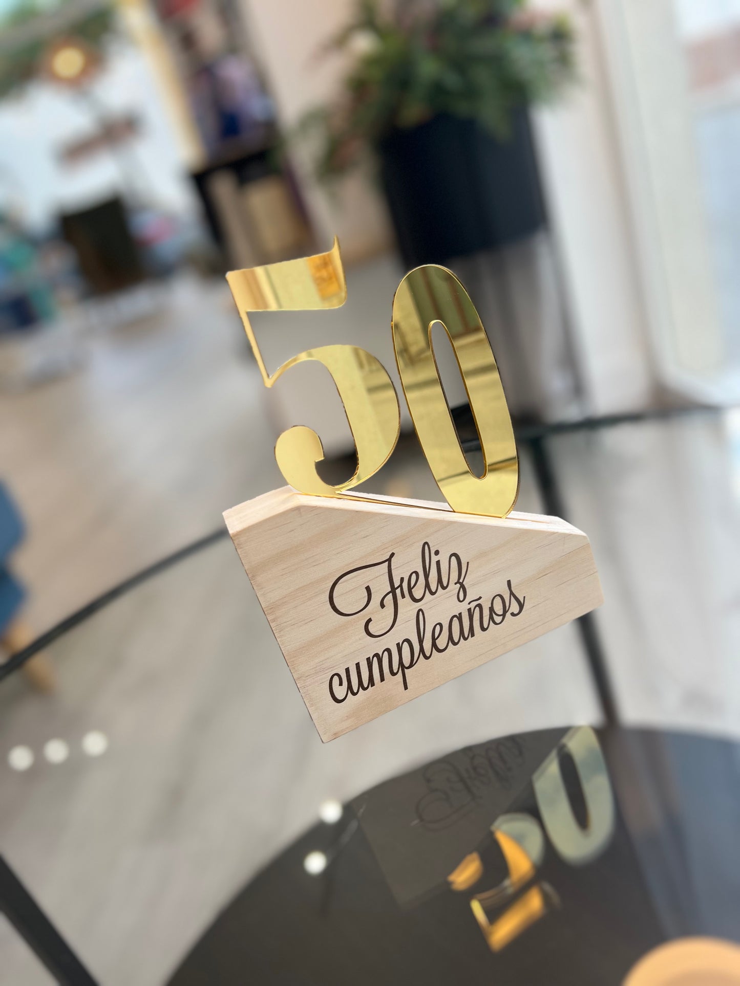 Trofeo número de oro