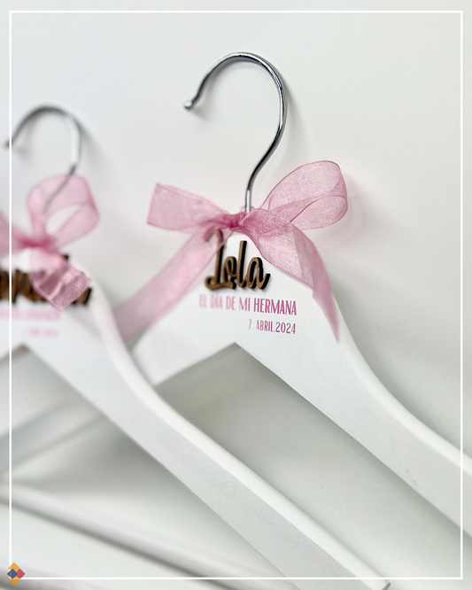 Perchas para hermanas